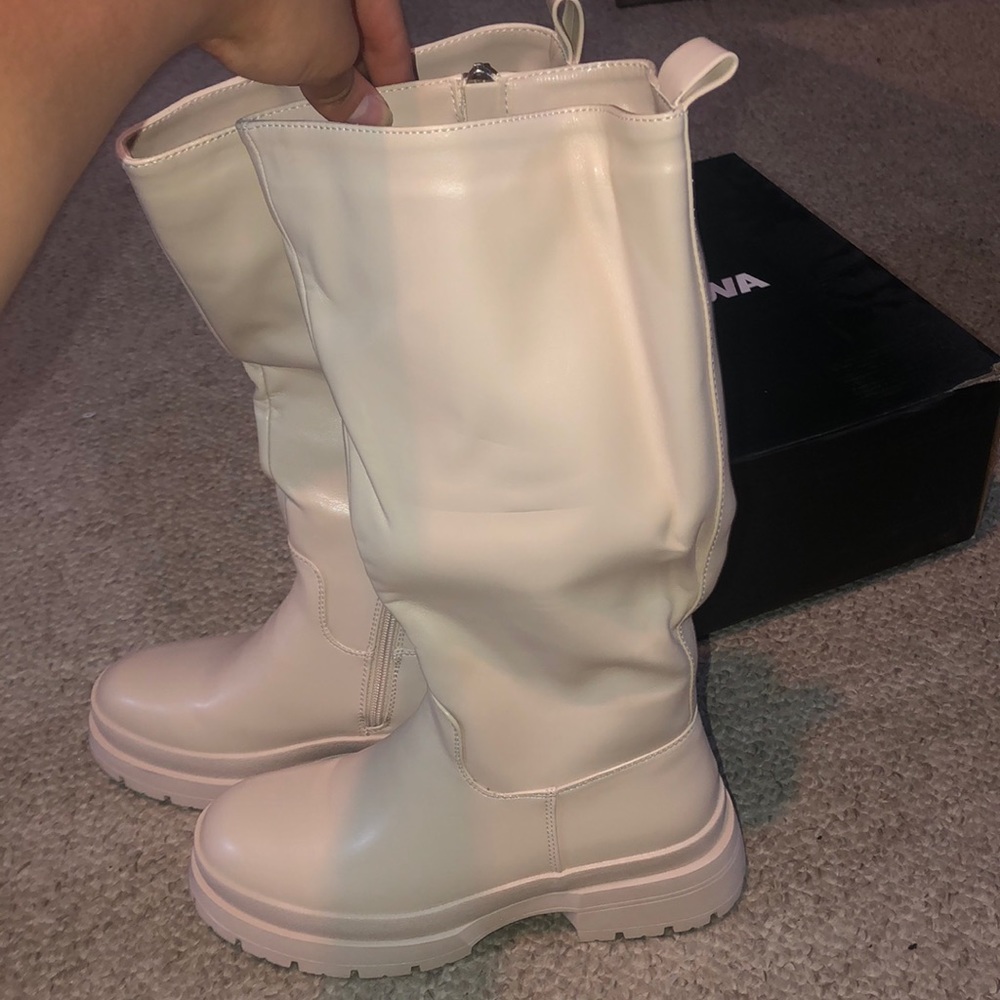 Never worn Fashion Nova boots